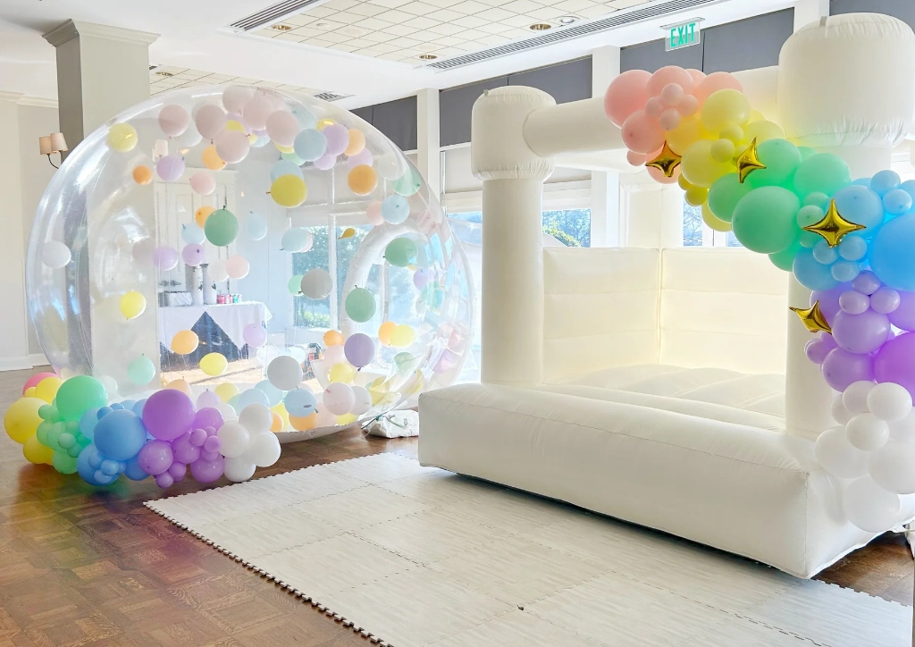 The Party Factory USA all-white bounce castle and bubble house setup — real client project by Get Website Express